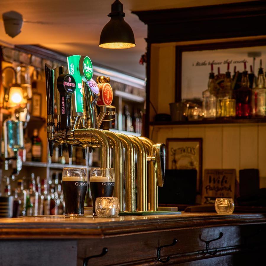 Castlemartyr Resort Hotel Exterior foto Beer taps in a pub